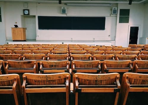 class room chairs and blackboard