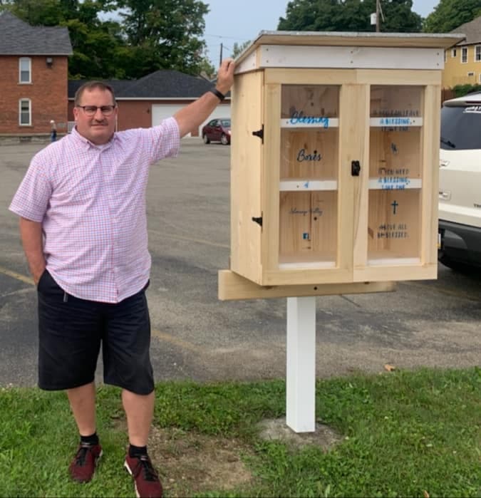 Pastor Jeff next to a blessing box